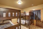 Cloud 9 Cabin downstairs bedroom Lower level bunk room - full bunks and twin bunks